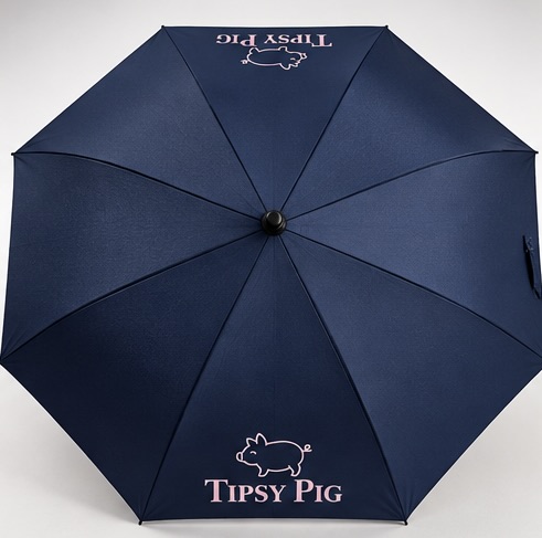 The Pig Protector umbrella, navy canopy with pink Tipsy Pig logo